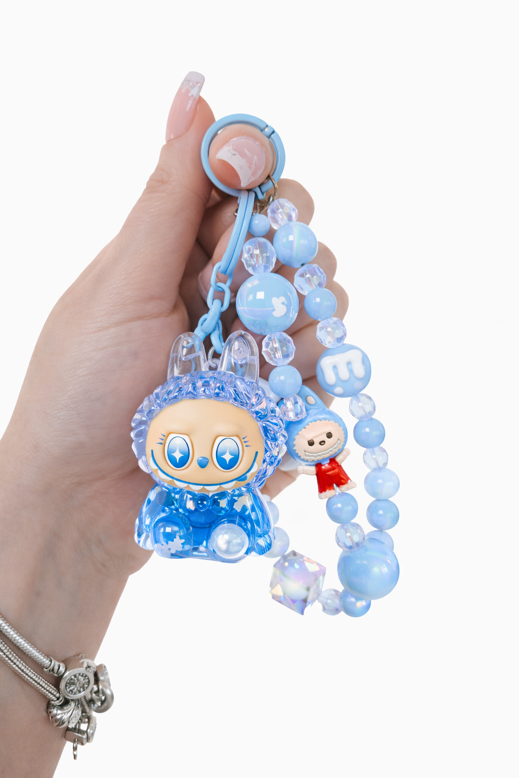 Porte-clé bracelet perles cristal et charm TOY kawaii sur fond pastel – Mimisu

