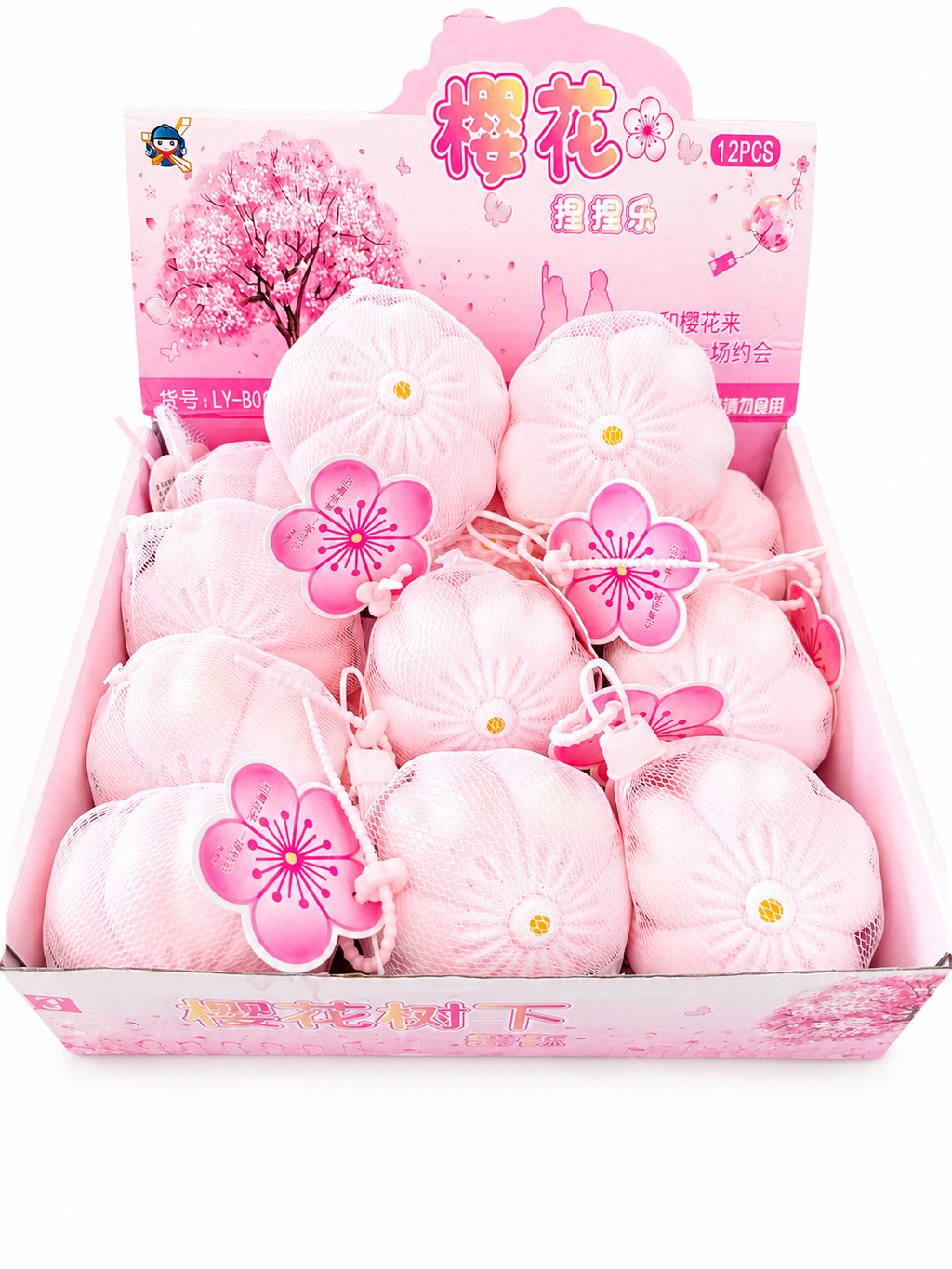 Squishy Sakura fleur de cerisier kawaii dans son filet blanc avec pendentif