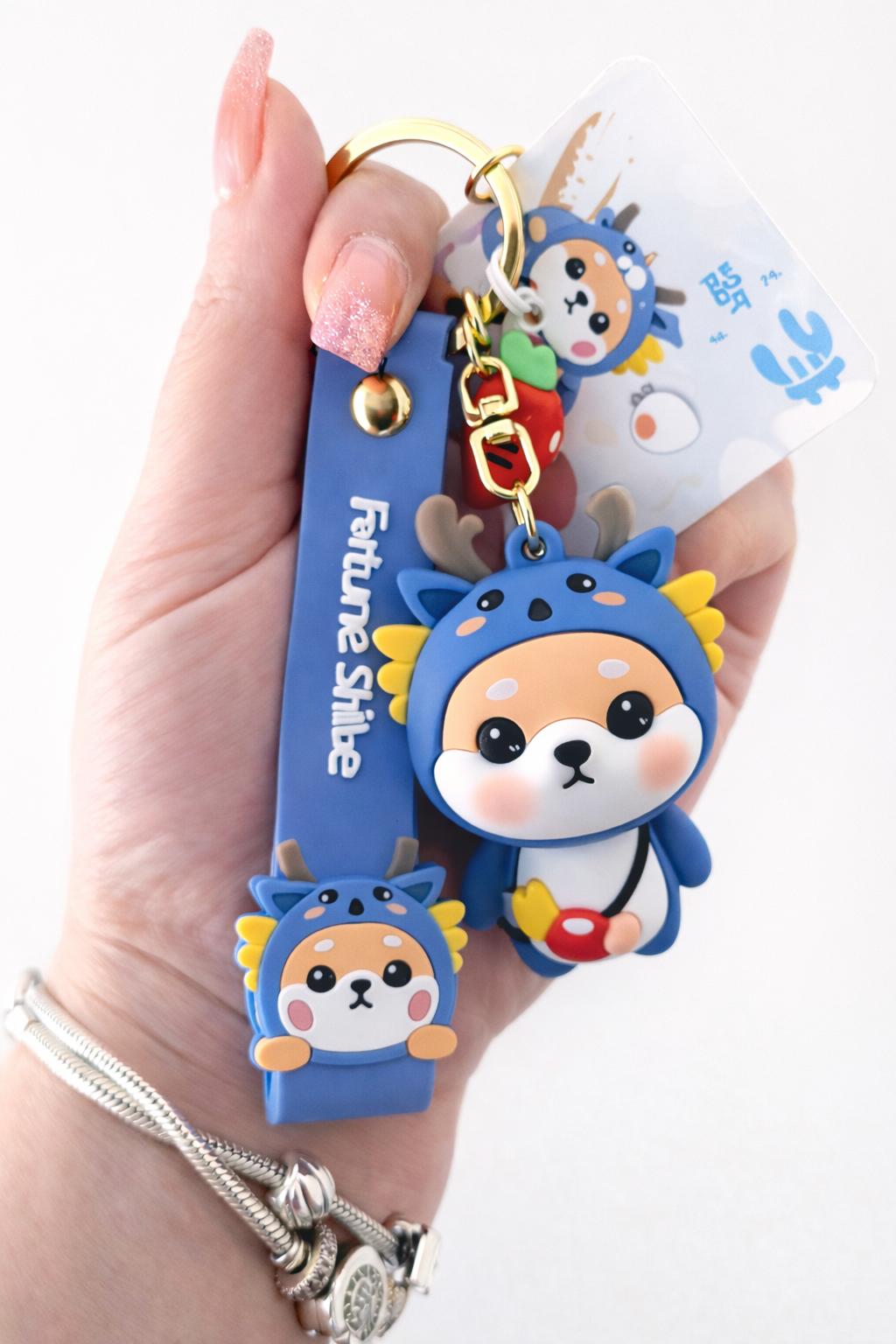 Porte-clé kawaii Shiba Inu lapin tenu en main pour montrer la taille – Mimisu
