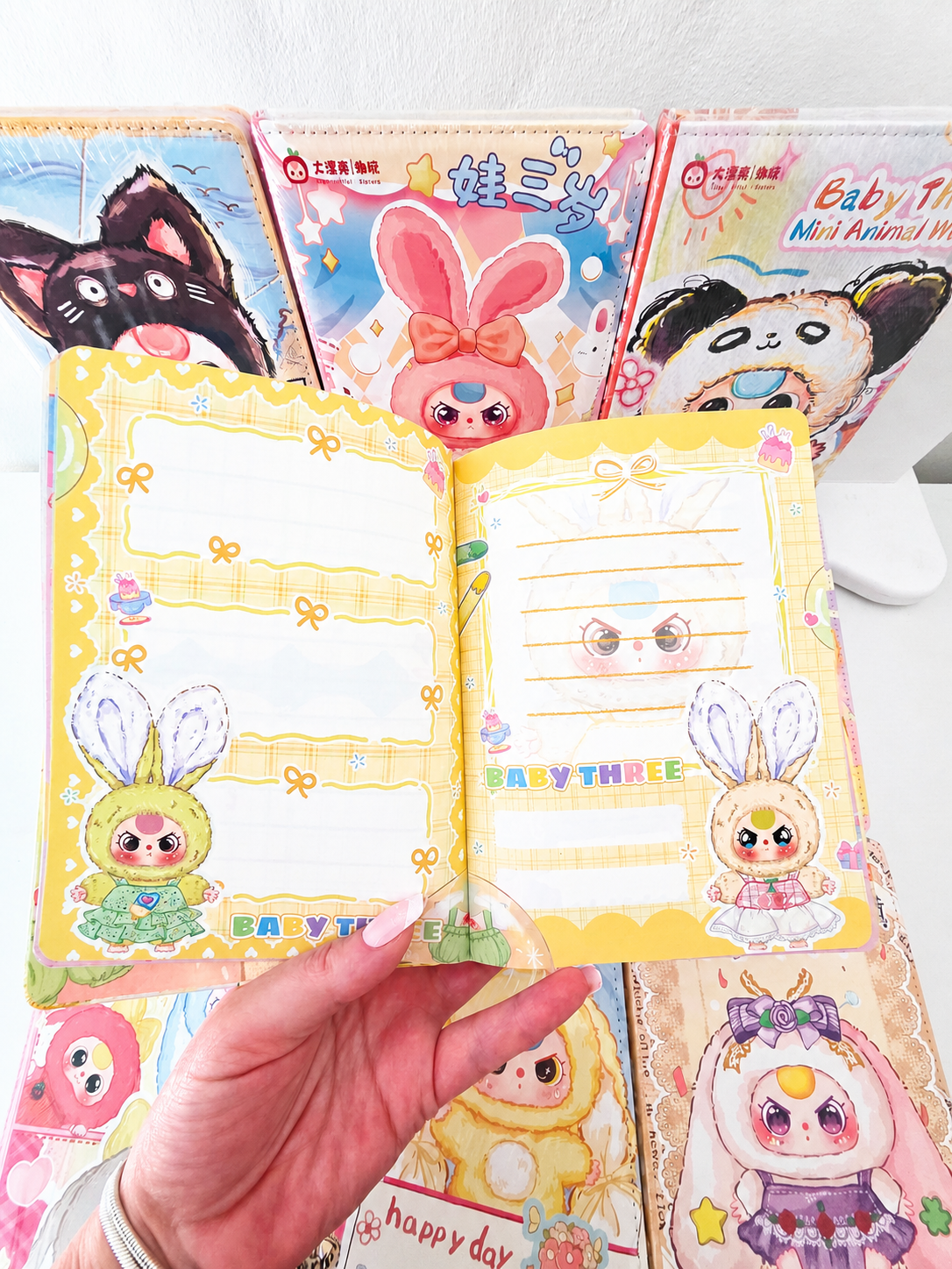Carnet journaling kawaii Baby Three ouvert pour montrer les pages intérieures – Mimisu
